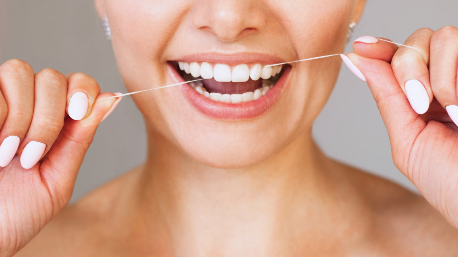 How to Floss Properly: Tips for Dental Success